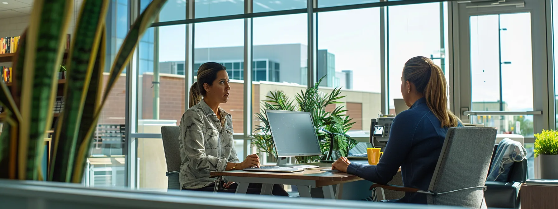 a person meeting with a mortgage professional in a modern office setting.