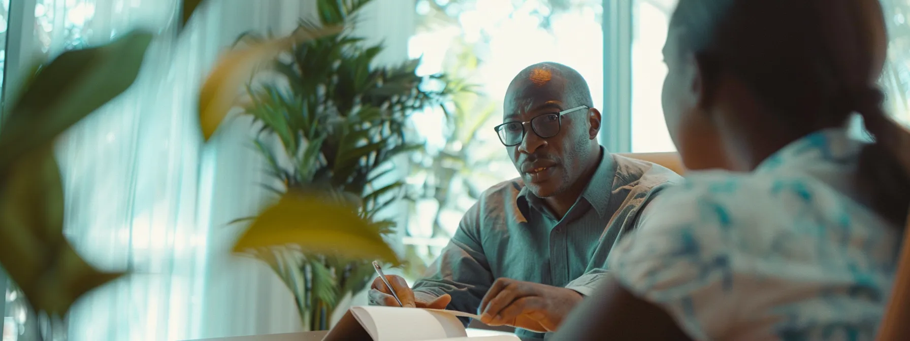a person comparing mortgage rates and loan terms with a professional lender in a modern miami office.